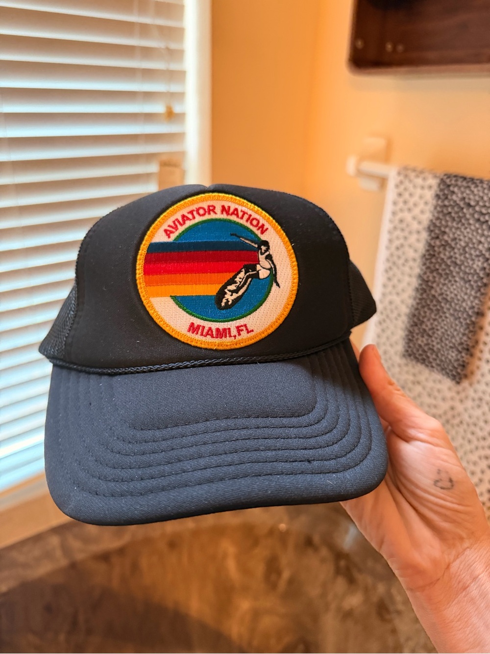 Aviator Nation Black Trucker Cap with Rainbow Stripe Logo